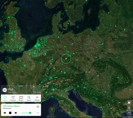 A screenshot of Radio Garden displaying the globe. A ring surrounds a location of a radio station. On the side, it states the name of the station, "ON Heavy Metal".